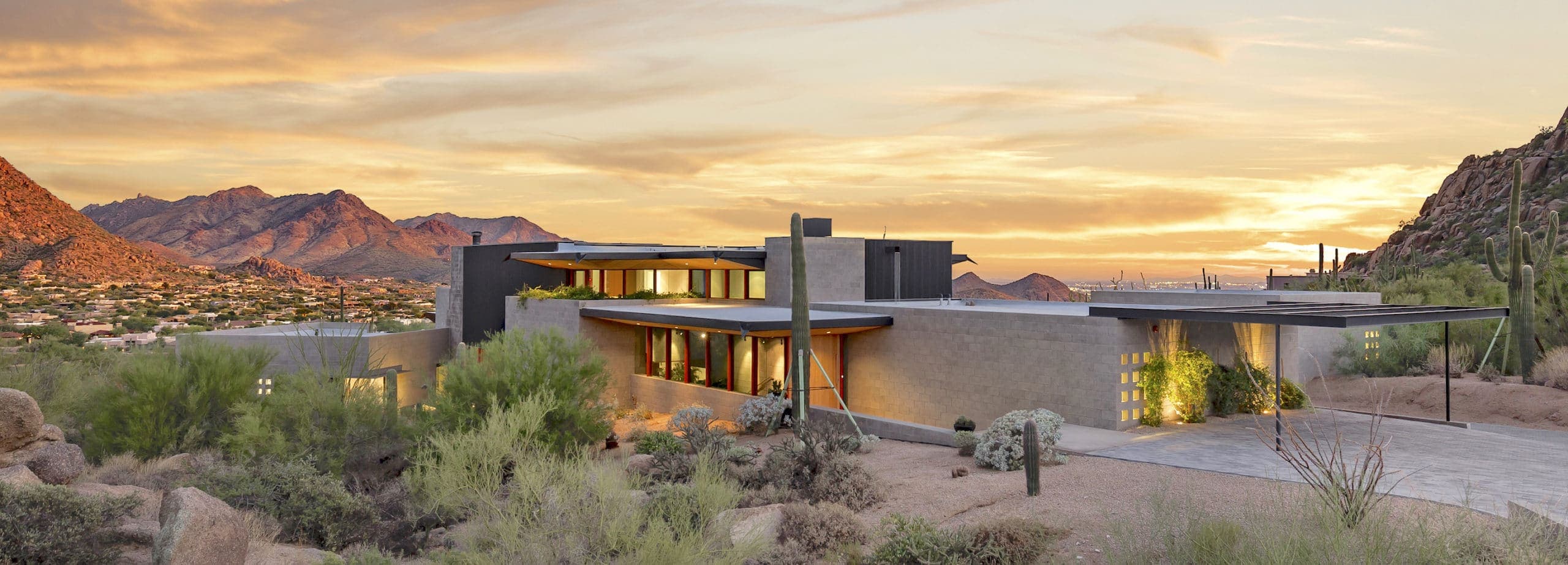 Phoenix luxury home at sunset with saguaro cactus